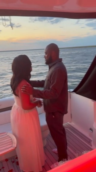 Romantic couple on sunset cruise
